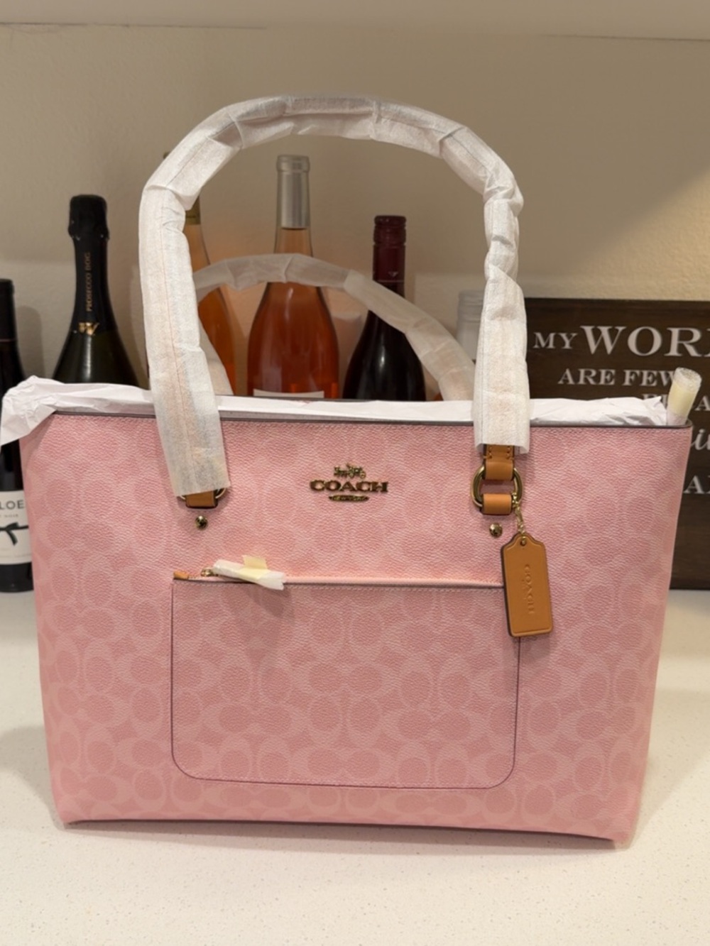 Powder Pink Station Tote in Signature canvas